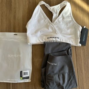 Alphalete amplify leggings in titanium and Alphalete surface wrap bra